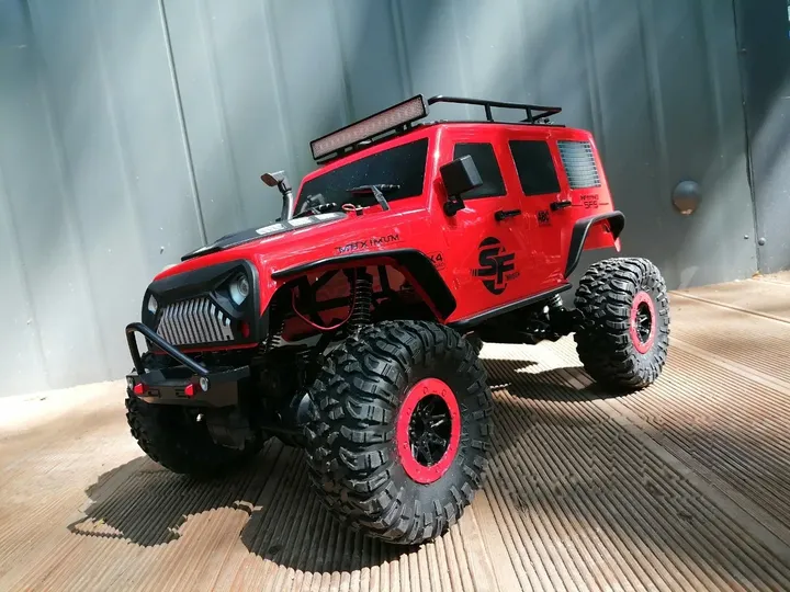 Jeep Rubicon красный трофи 1:10 — вид спереди справа